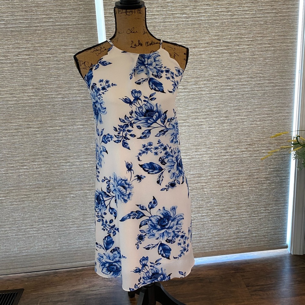 White formal dress with floral designs